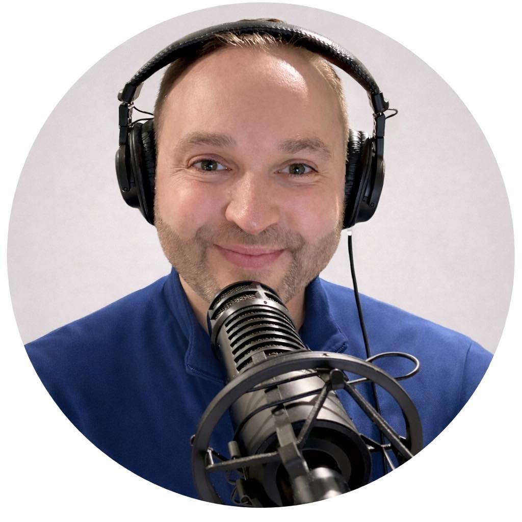 Voice-over artist Rob Daniels recording in a professional radio studio with microphone and headphones